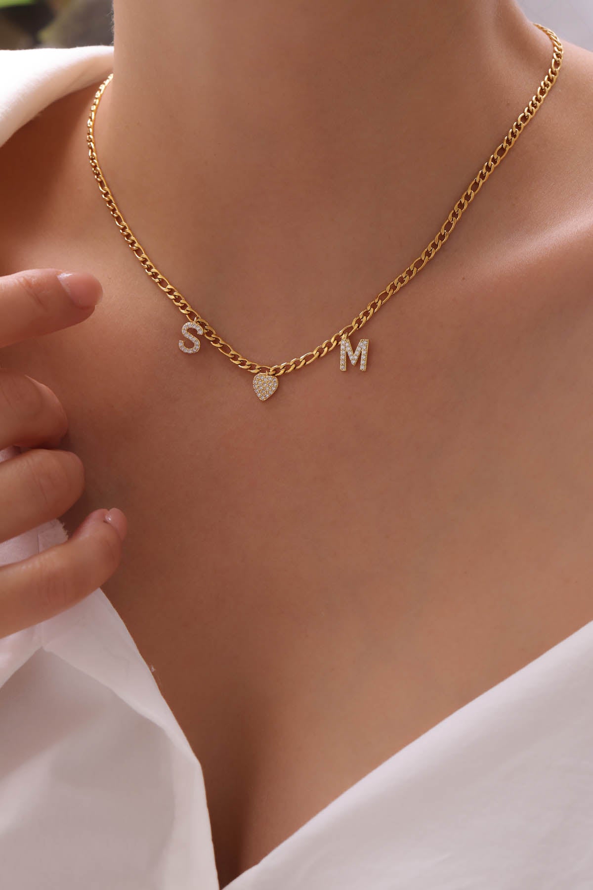 Two letters with a heart