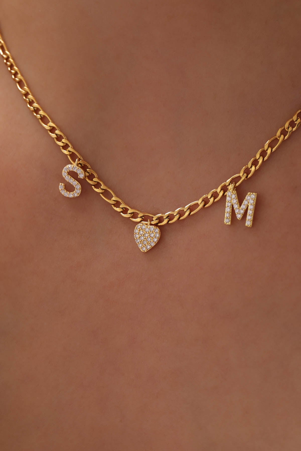 Two letters with a heart