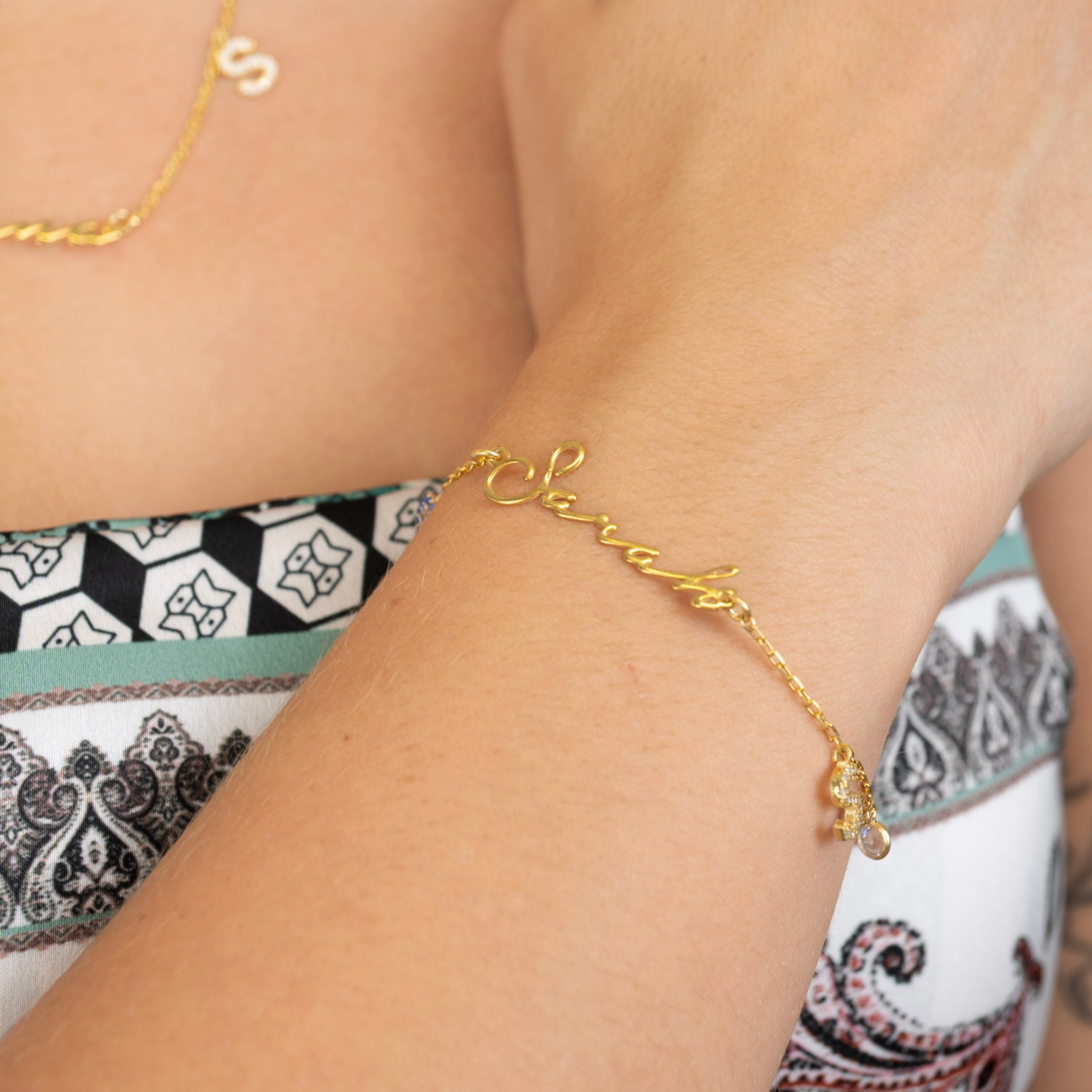 Bracelet prénom Notera avec initiale et porte-bonheur